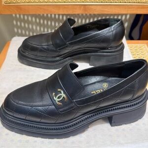 CHANEL Black Loafers with Gold Logo